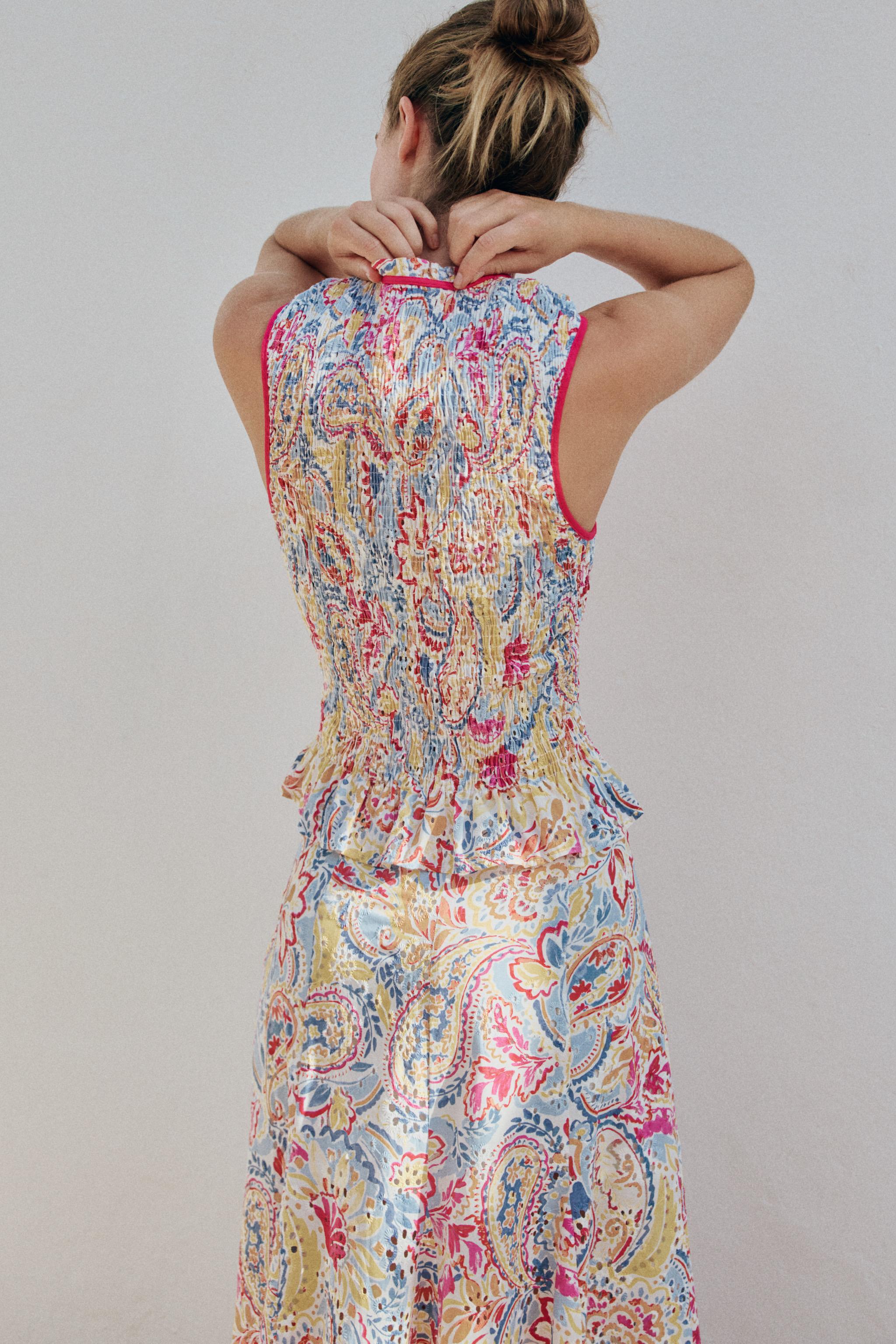 PRINTED EMBROIDERED EYELET TOP